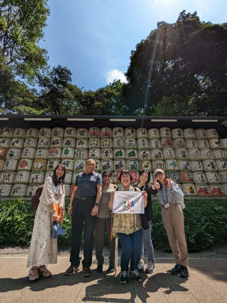 A small group tour by the sake barrels at Meiji Shrine in Tokyo.