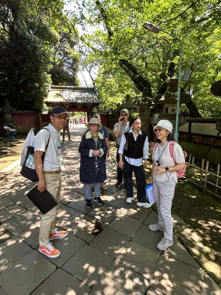 Three guests and two guides at Toshogu Temple in Ueno, Tokyo.